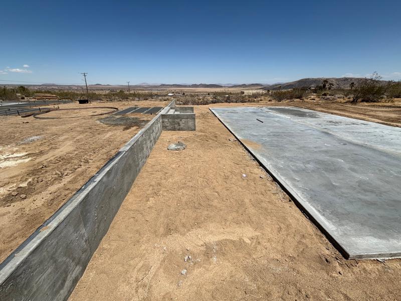 Board-formed wall and slab by Dig Deep Concrete